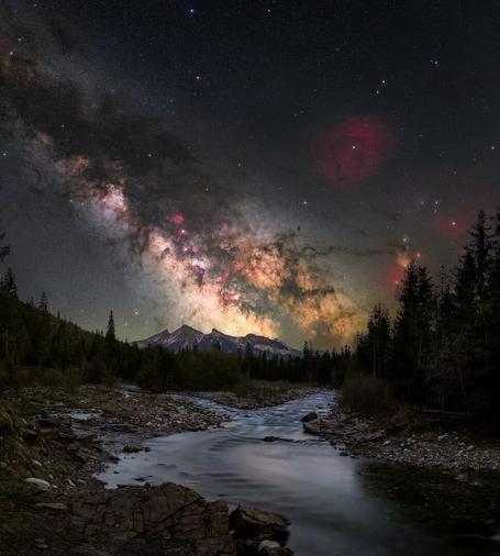 a stunning photo of the vibrant milky way in a star studded sky