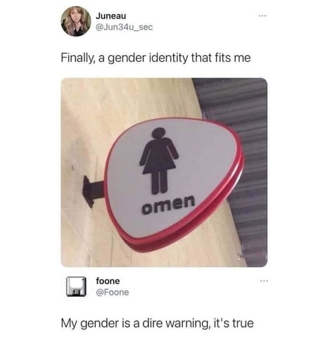 The image features a tweet from a user named Juneau ([@]Jun34u_sec) with the caption "Finally, a gender identity that fits me." Below the caption is a photo of a restroom sign with a red border and a white background. The sign depicts a black silhouette of a female figure and the word "omen" written below it. The sign is mounted on a wall, and the background appears to be a tiled surface.

Below the image, there is a reply from a user named foone ([@]Foone) with the caption "My gender is a dire…
