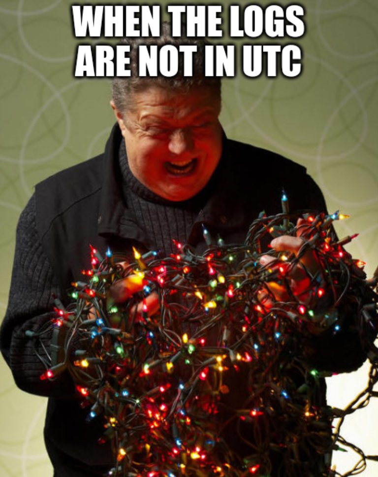 Angry dude holding a tangled mess of Christmas lights with the caption "When the logs are not in UTC."