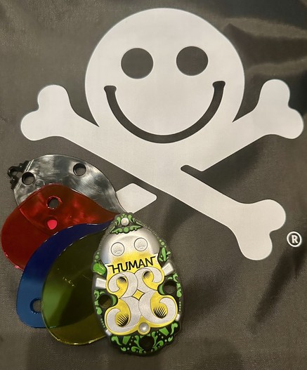 Defcon 33 badge and bag