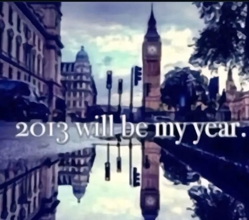 A blurred, tumblr-style motivational photo of what I think is Big Ben after a rain with the sky's reflection in a puddle. The text overlay says:
2013 will be my year.