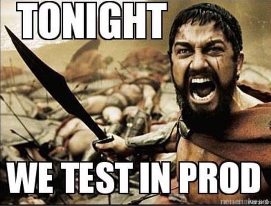The image features a person in a warrior-like pose, holding a large, curved sword. The individual is wearing a brown, tattered garment, reminiscent of ancient Greek or Roman attire. The background depicts a chaotic battlefield scene with numerous fallen soldiers, suggesting a historical or epic battle setting. The text "TONIGHT WE TEST IN PROD" is prominently displayed in bold, white capital letters, overlaying the image. The overall tone of the image is dramatic and intense, with a humorous un…