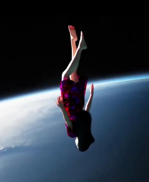 Video of a girl in a dress falling to earth head first from outer space before glitching out of existence. Upper atmospheric reinsertion from low orbit was successful.