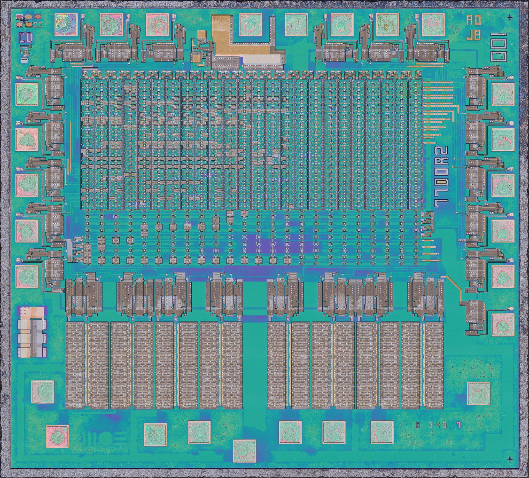 The same but with metal removed. This exposes nicely coloured diffusion and poly features.