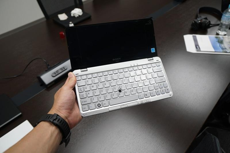 A stock image of a Sony Vaio P held in hand to show scale. The old netbook is basically a minimal but full size keyboard with a short but wide screen to fit it. It's a small form factor. About as small as you can get and still have a fullish sized keyboard.