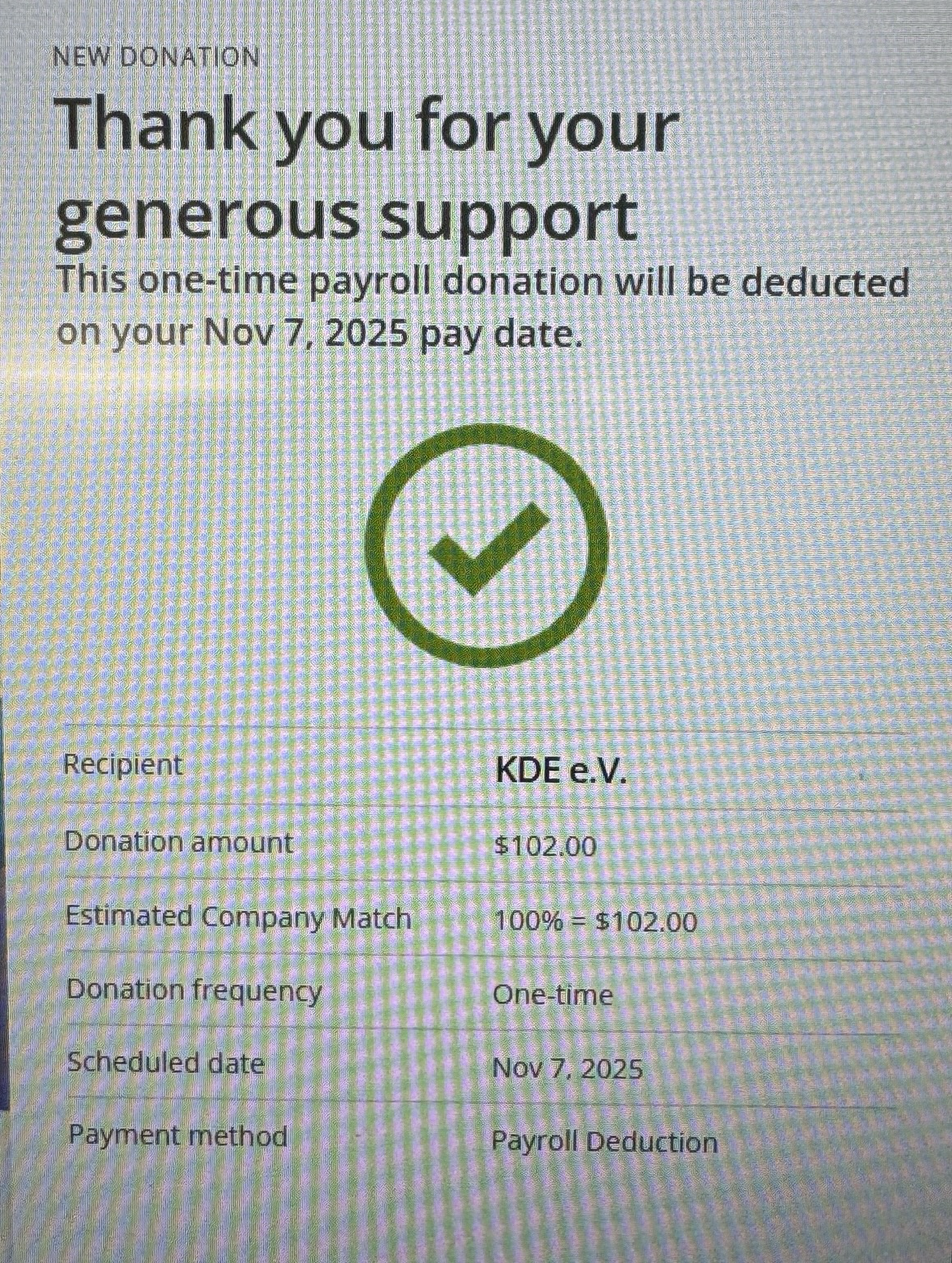 Photo of a screen showing a donation to KDE e.V. Through a benevity site.