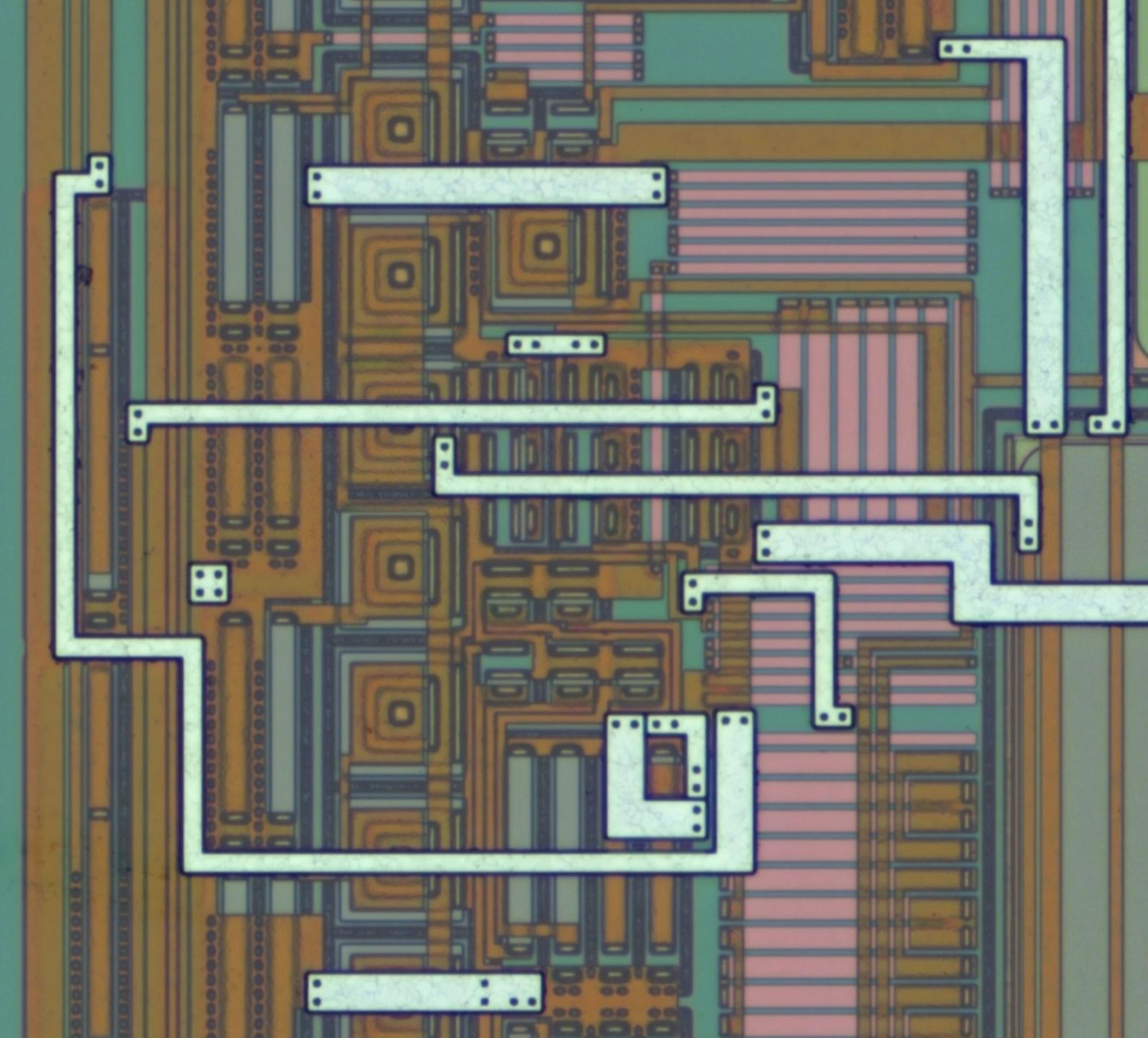 A close-up of an analog part of the chip, showing the variety of colour.
