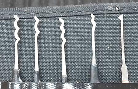 Several of Sparrows Rake picks showing the working end.