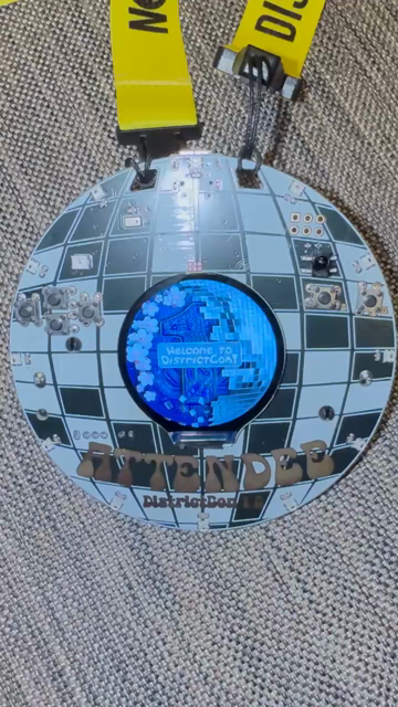 Video of the flashing badge at DistrictCon