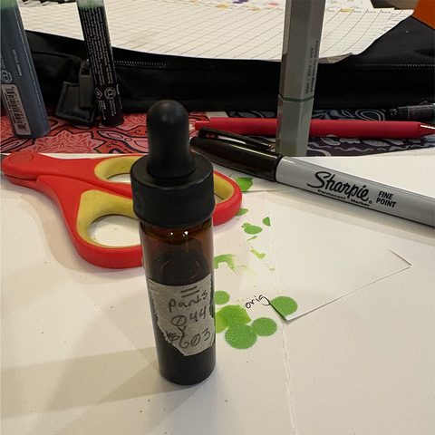 labeled glass bottle on table