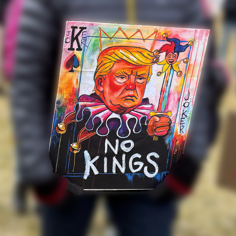 Trump on a playing card where the “K” in the suit is part of the work “JOKER”.