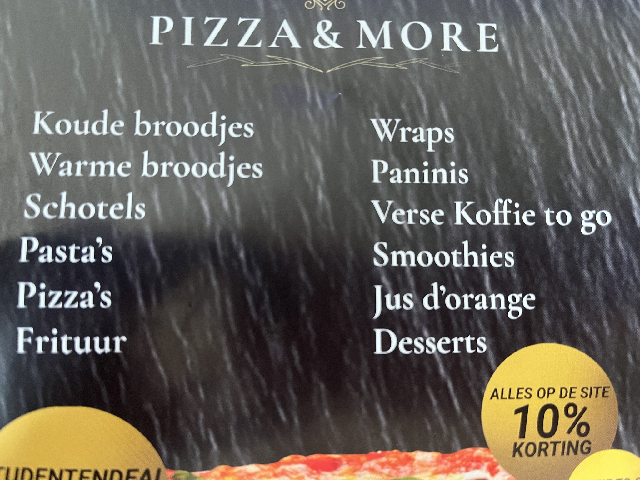 Photo of a pizza place menu that is in Dutch… well like at least 50% Dutch