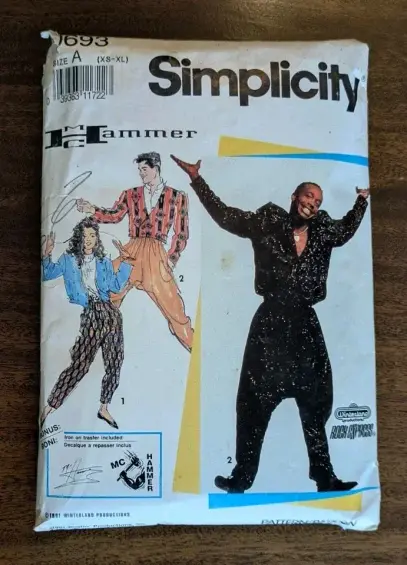 The image displays the front cover of a vintage Simplicity sewing pattern for outfits inspired by the artist MC Hammer. The pattern is designated as number 0693 and is available in size A (XS-XL). The background of the pattern cover is predominantly white with some yellow and blue abstract shapes in the lower right corner.

The main visual elements are illustrations of people wearing the designed garments. On the left, there is a depiction of a man and a woman. The man wears a cropped, patterne…