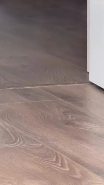 Dramatic video to music with a heavy bass of a gray cat walking around the corner towards the camera. The slightly slowed down footage fully captures the majestic of this fluffy chonker walk. Whatever the boss wants, the boss gets.