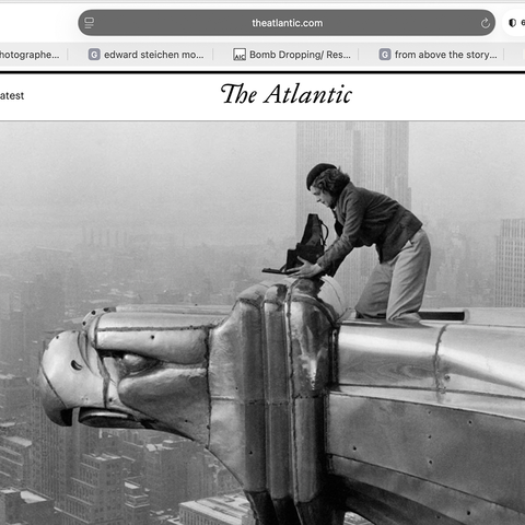 Atlantic article with photo: Margaret Bourke-White, a photographer for LIFE magazine, makes a precarious photo from one of the eagles on the 61st floor of the Chrysler Building in New York City in 1934 