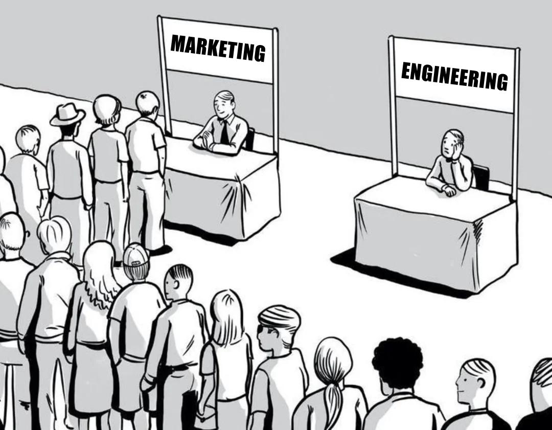 Meme: crowded (marketing) vs empty stall (engineering) comic