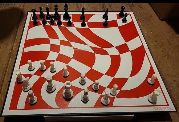 Photo of a chess board titled "Chess II" with very curvy lines with white & red "squares". I say squares, but you need to imagine them being tickled to give better visual description.