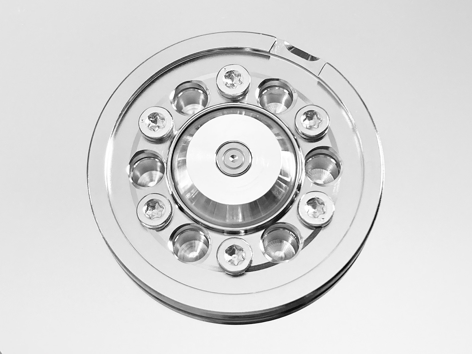 Close-up of the metal ring that holds hard disk drive platters on the spindle.