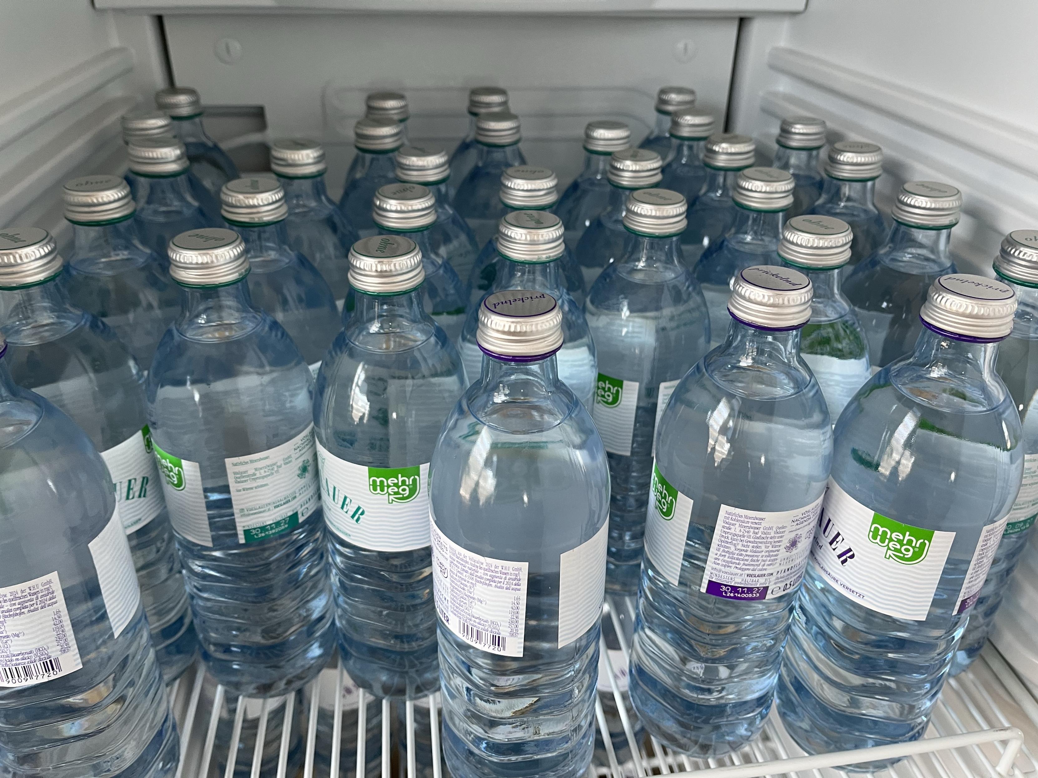 Freezer with plenty of water bottles