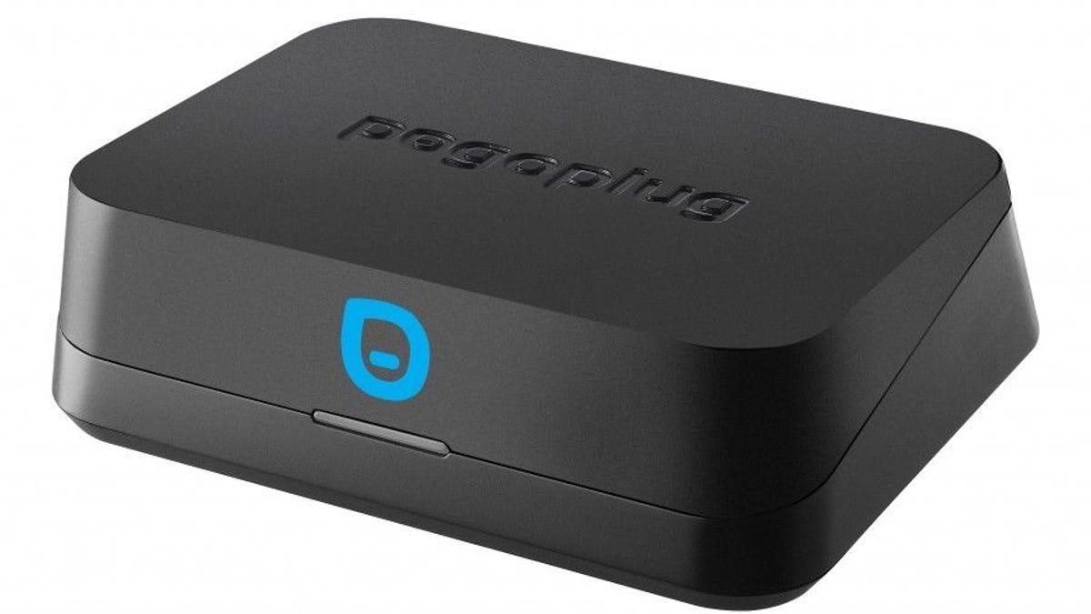 A PogoPlug. It's around the size of a phone, has black plastic housing, and one LED bar in the front.