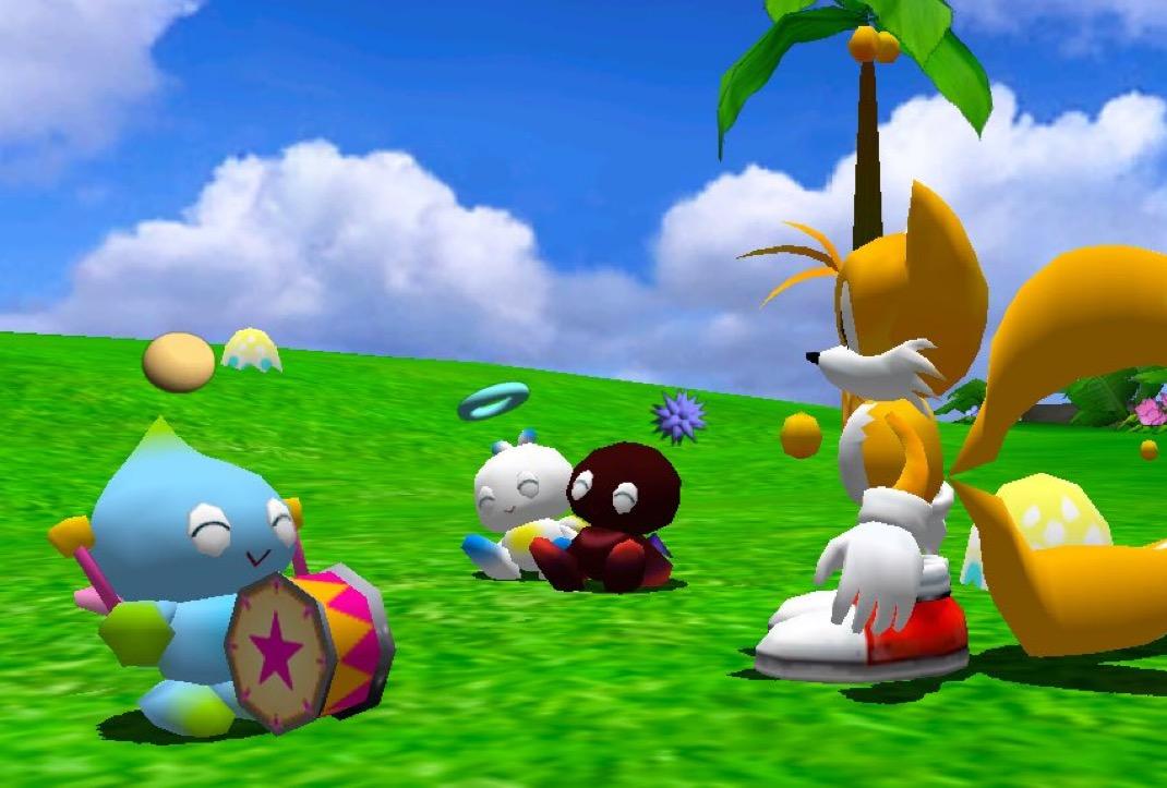 Colorful 3D game scene with cute round characters on a green hillside, including a blue character and golden fox-like creature