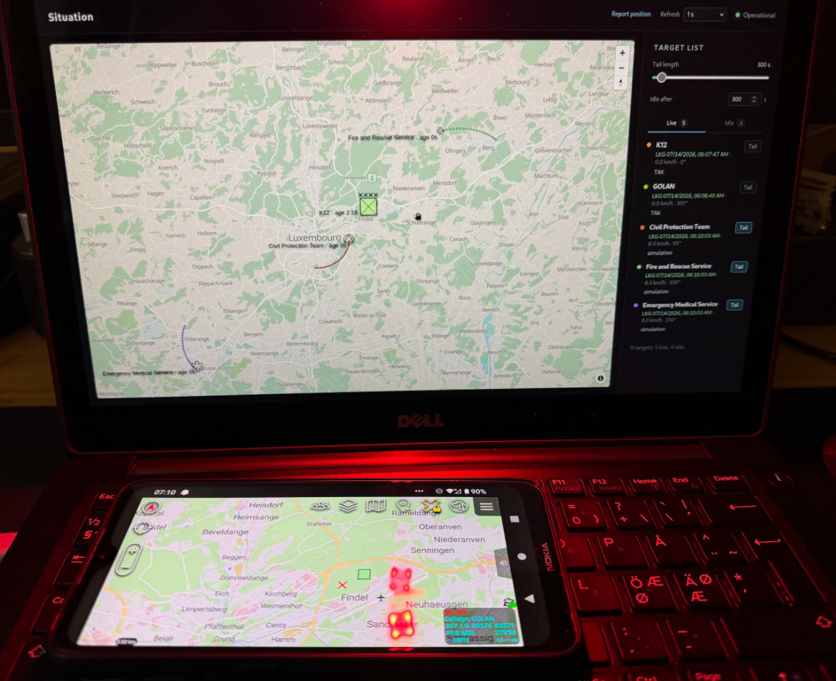 Laptop displaying map with Android phone running ATAK client.