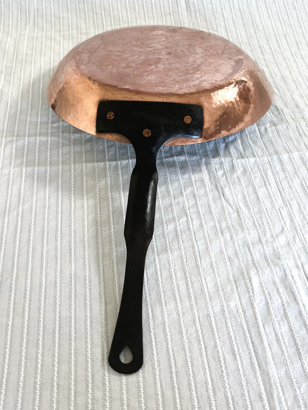 Bottom side of the hand-raised copper frying pan from Rocky Hill Forge