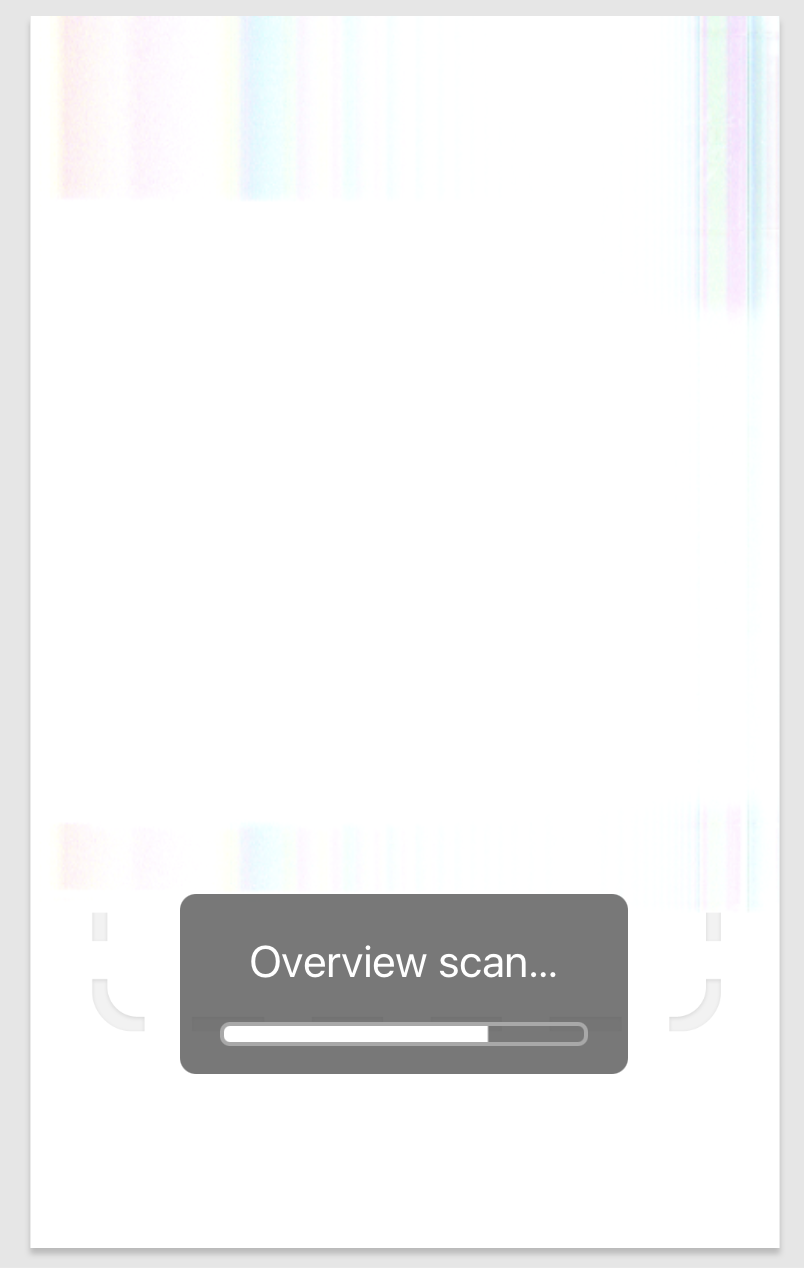 Screenshot from Mac showing a preview scan window, progress bar at the bottom but the scan is mainly white with small pixels of colour dotted about.