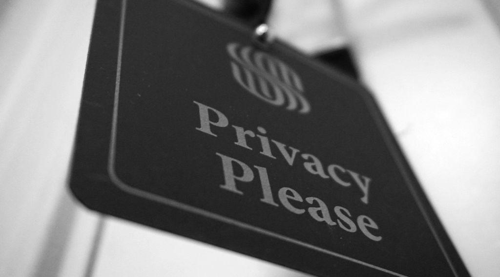 A sign stating "Privacy Please."