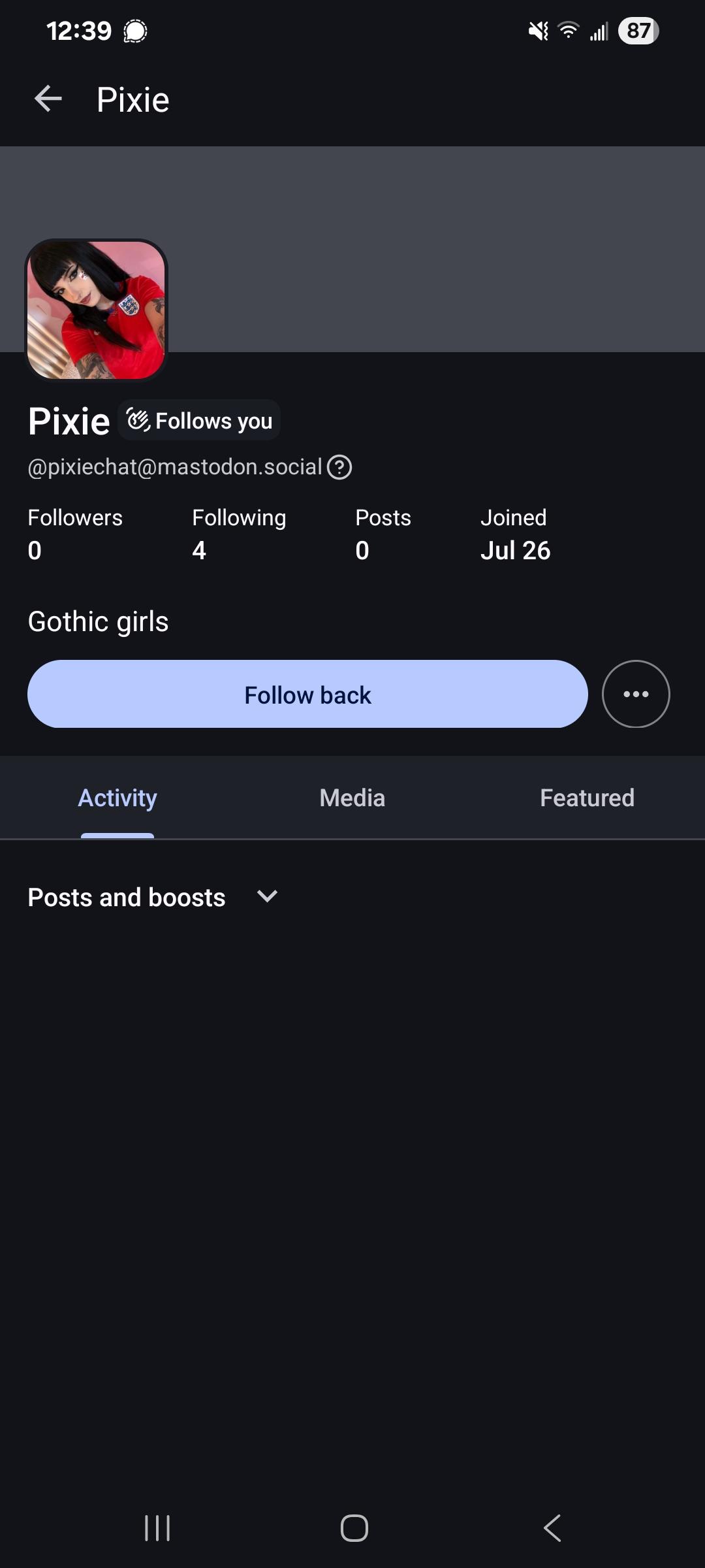 Screenshot of a Mastodon account on mastodon.social, with either an AI generated photo or a stolen photo of a skinny white woman, tattoos, and dark hair. The profile description is "Gothic Girls". The username is pixiechat@mastodon.social.