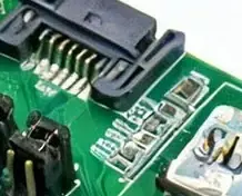 A cropped in version showing a nonsensical connector, garbled silkscreen and multiple SMD resistors merging together.