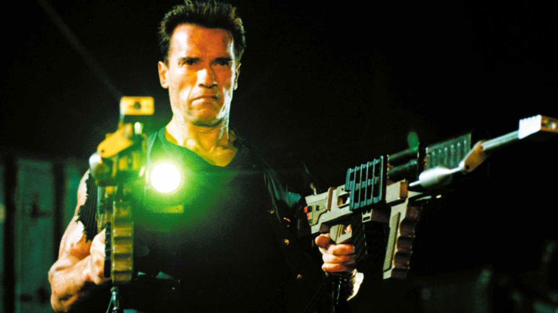 Arnold Schwarzenegger dual wielding railguns from the movie Eraser