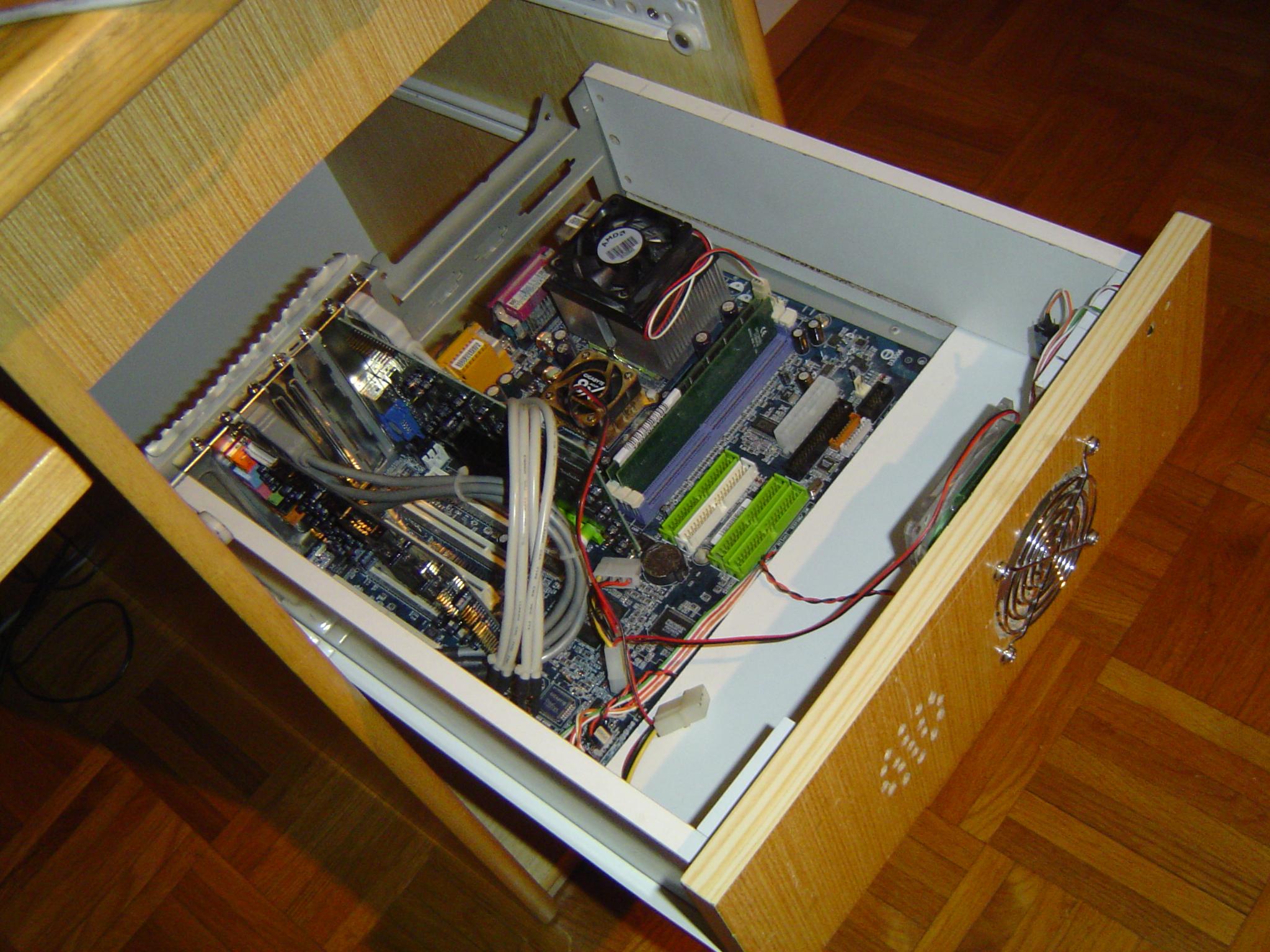 View of the bottom drawer, showing a populated ATX motherboard