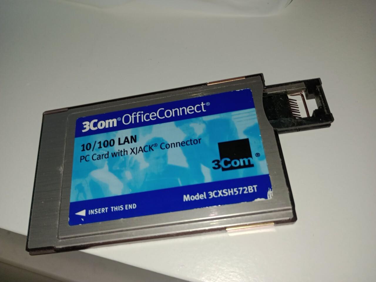 PCMCIA card with a pop-out RJ45(8p8c) jack that might have been more flimsy than the dongle it replaced. 

the traction needed to keep the cable at just the right angle required so many desk lamps, rubber bands, and paperclips.