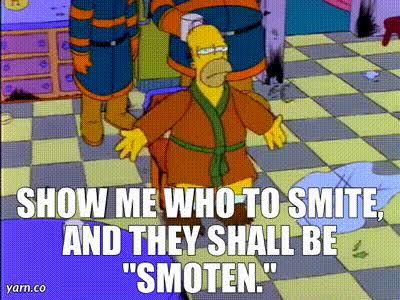 Homer Simpson kneeling on the floor saying "show me who to smite and they shall be smoten"