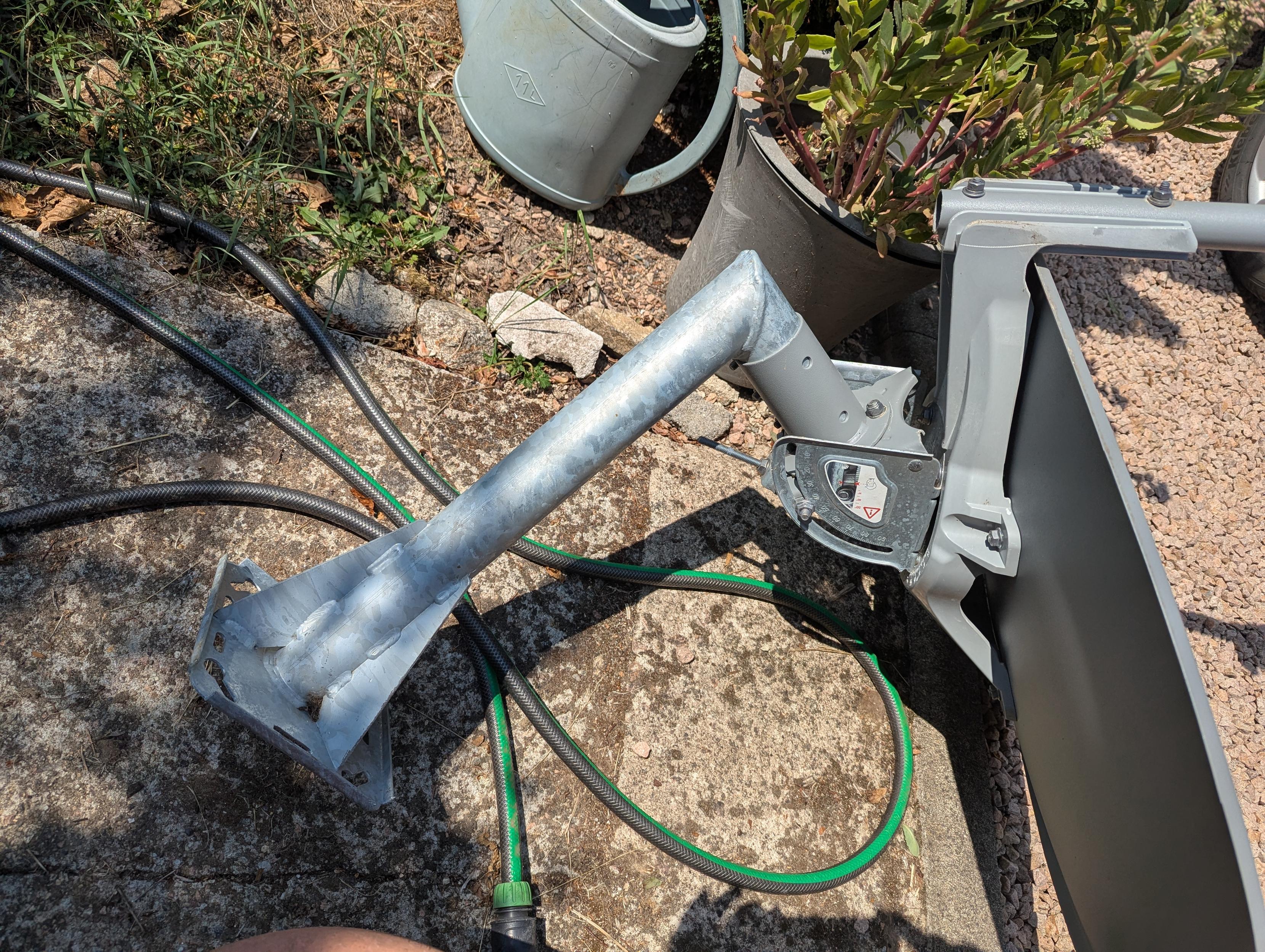 The mounting bracket. It looks like it could withstand hurricane-force winds.