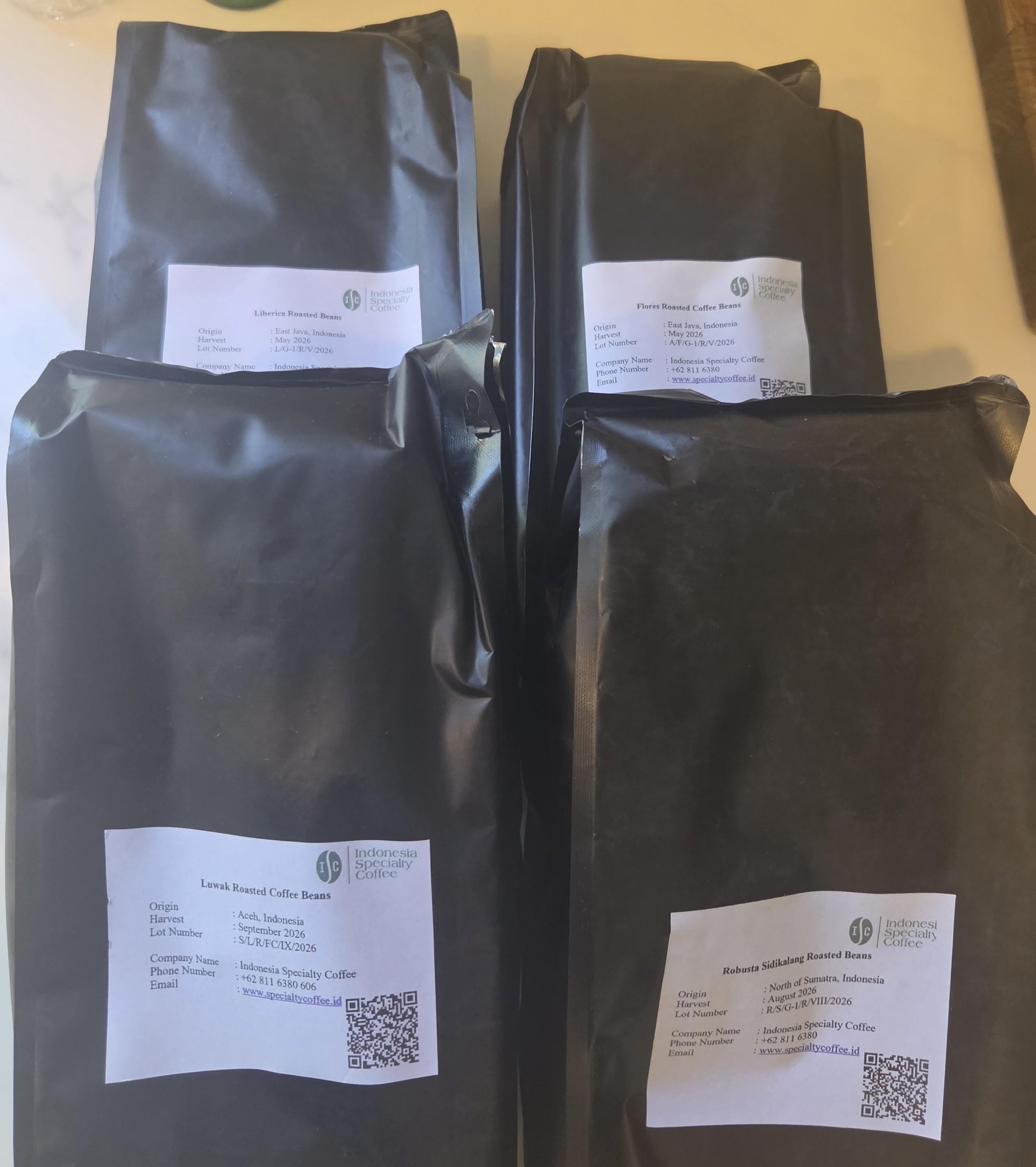 Four big bags of different Indonesian coffee beans